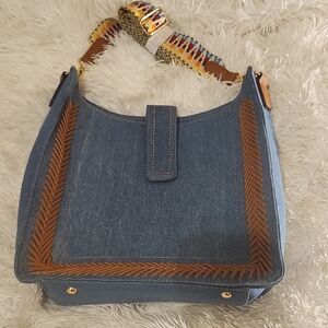 The Cato Women's Denim Hobo Crossbody Bag. 